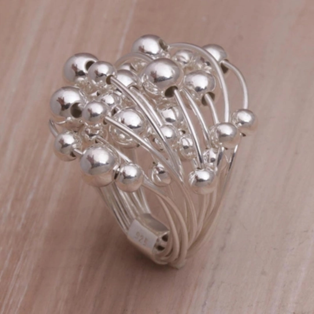 Bague vintage en argent avec pousses de plantes