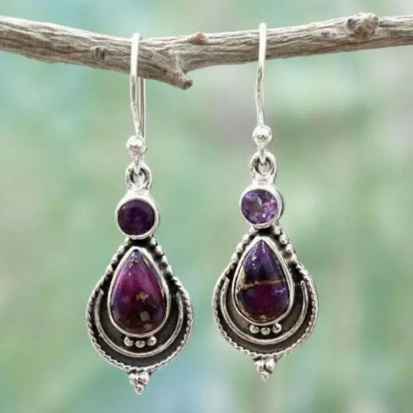 Boucles d'oreilles vintage pendantes avec pierres violettes