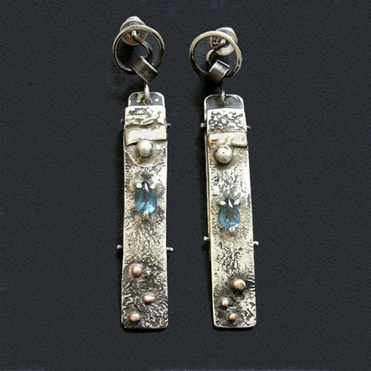 Boucles d'oreilles artisanales en pierre bleue