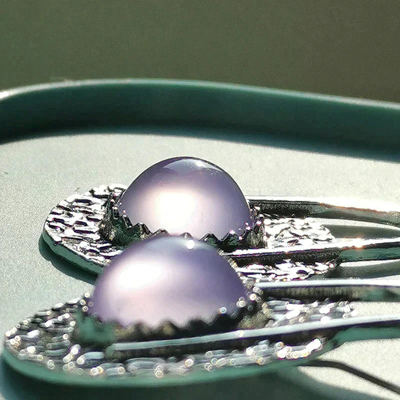 Boucles d'oreilles bohèmes avec pierres violettes en argent sterling