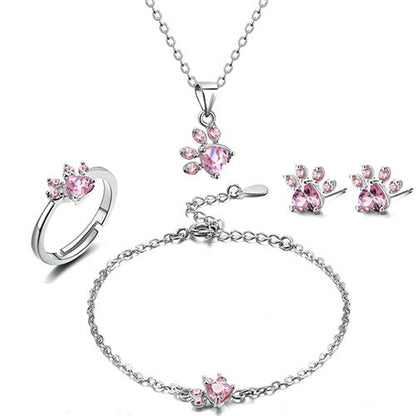 Ensemble de bijoux en or rose avec motif patte – 4 pièces avec cœur en zircone (bague, collier, boucles d'oreilles, bracelet)