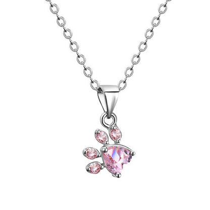 Ensemble de bijoux en or rose avec motif patte – 4 pièces avec cœur en zircone (bague, collier, boucles d'oreilles, bracelet)