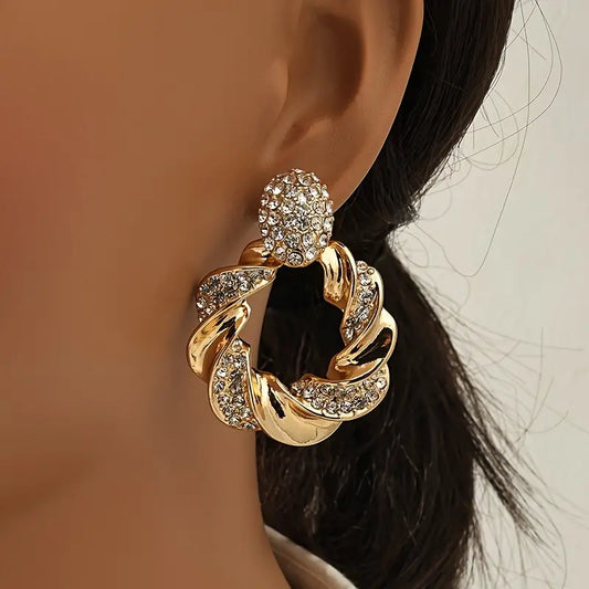 Boucles d'oreilles vintage tressées dorées brillantes