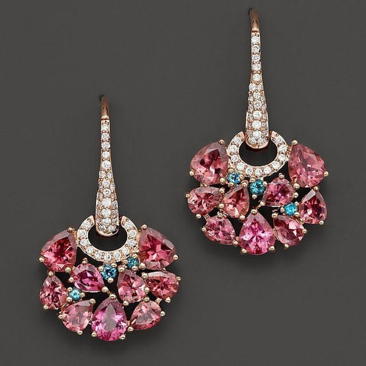 Boucles d'oreilles vintage en verre rose et or