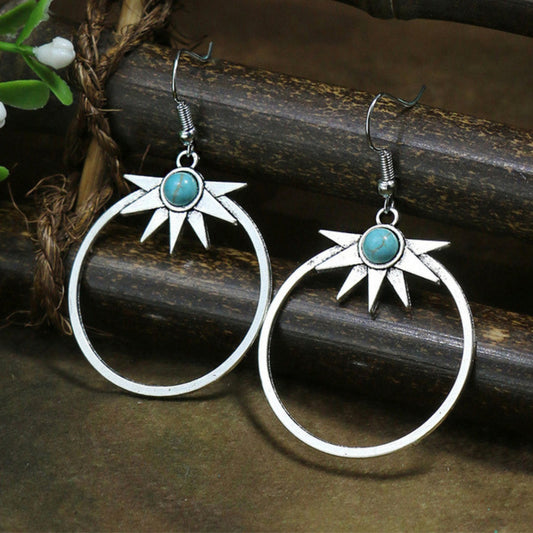 Boucles d'oreilles bohèmes en argent avec opale demi-soleil
