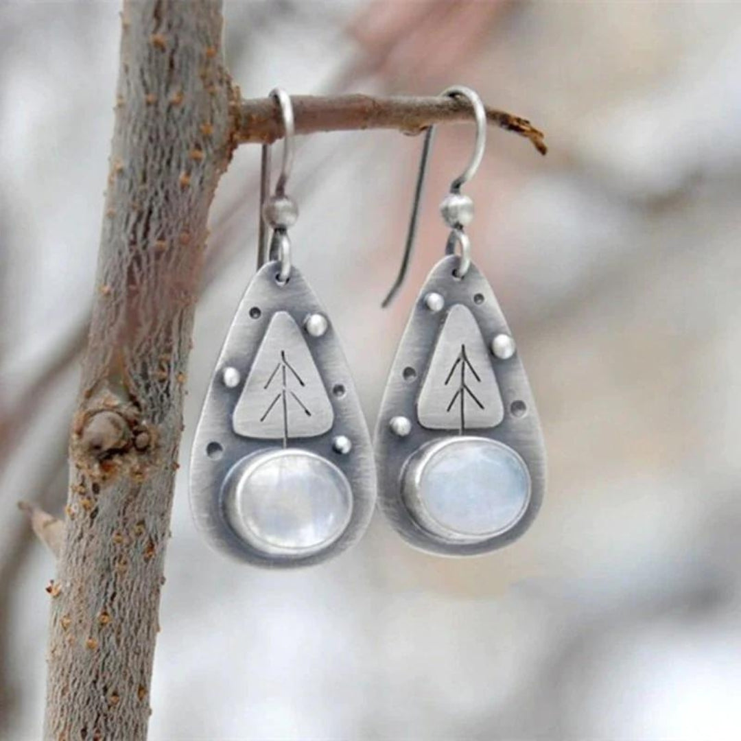 Boucles d'oreilles bohèmes avec opale blanche en argent