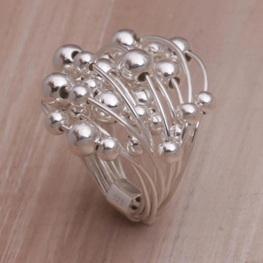 Bague vintage en argent avec pousses de plantes