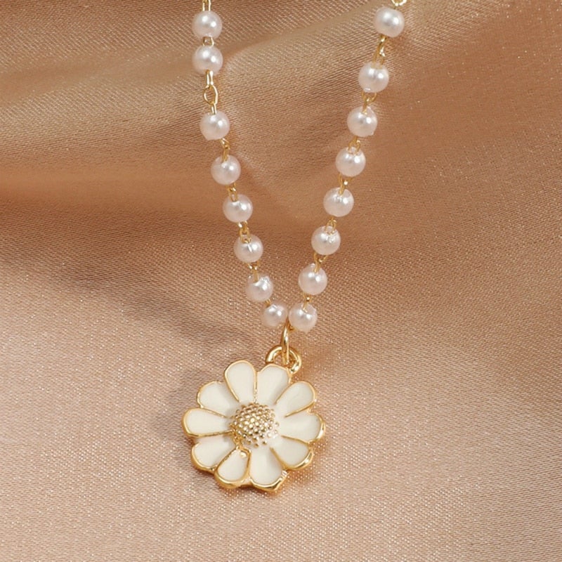 Pendentif marguerite avec perles
