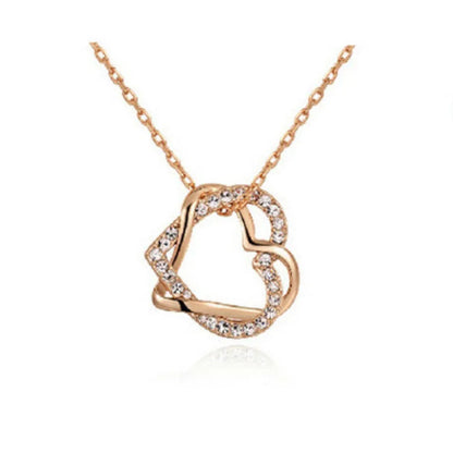 Collier et boucles d'oreilles en diamant en forme de cœur