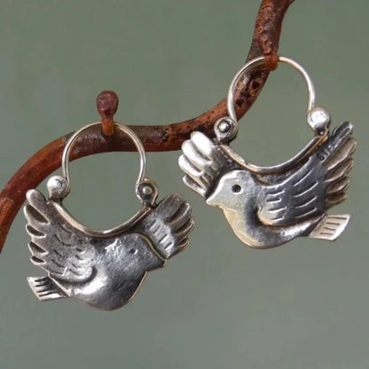 Boucles d'oreilles pendantes inspirées des oiseaux bohèmes – Ton argenté