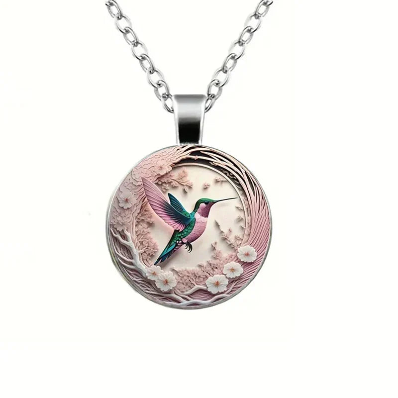 Collier pendentif colibri sous cloche en verre