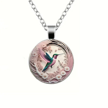 Collier pendentif colibri sous cloche en verre