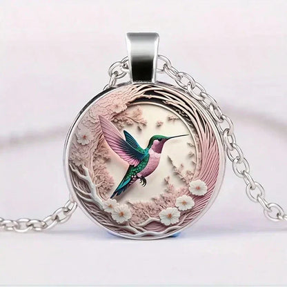 Collier pendentif colibri sous cloche en verre