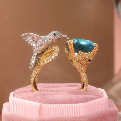 Bague ajustable avec colibri couleur aigue-marine – plaquée or 14 carats