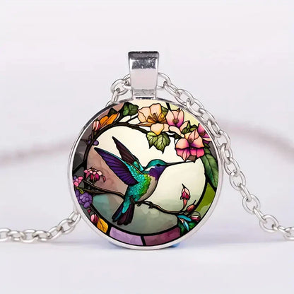 Collier pendentif colibri sous cloche en verre