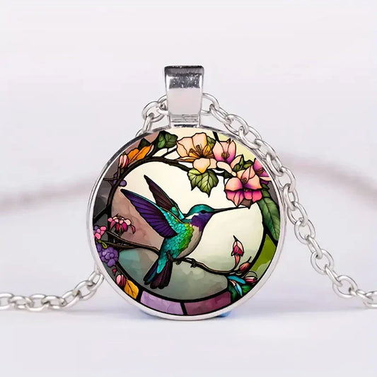 Collier pendentif colibri sous cloche en verre