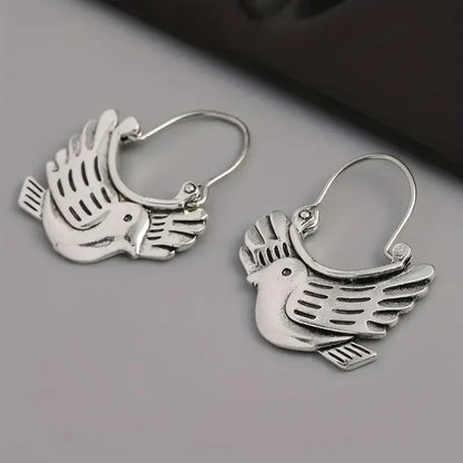 Boucles d'oreilles pendantes inspirées des oiseaux bohèmes – Ton argenté