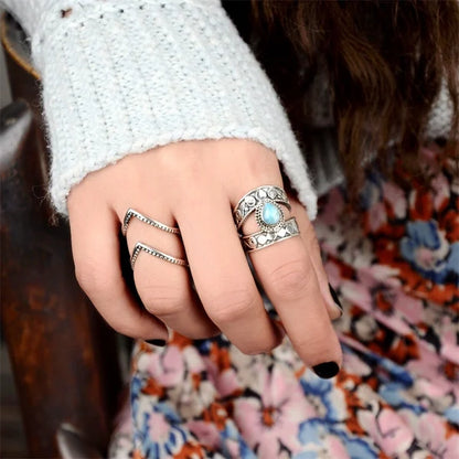 Bague ajourée avec pendentif turquoise