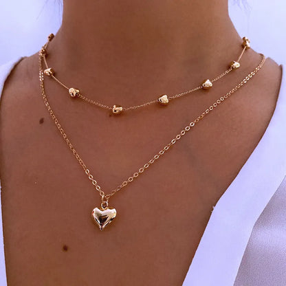 Collier vintage avec pendentif double cœur