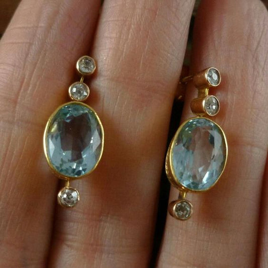 Boucles d'oreilles vintage en zircone bleue et or