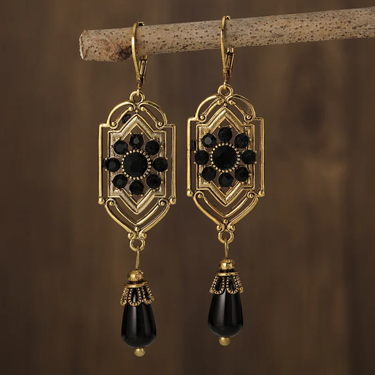 Boucles d'oreilles vintage pendantes avec pierres noires