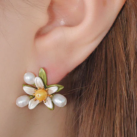 Boucles d'oreilles vintage marguerite et perle