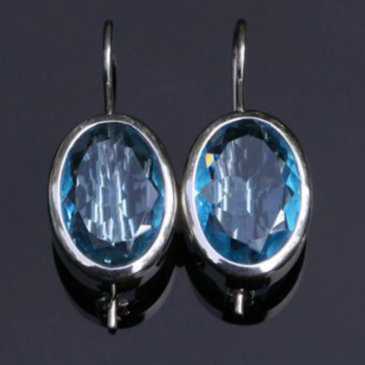 Boucles d'oreilles vintage en verre incrusté bleu