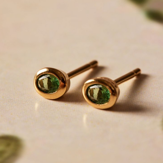 Boucles d'oreilles vintage en verre vert incrusté et or