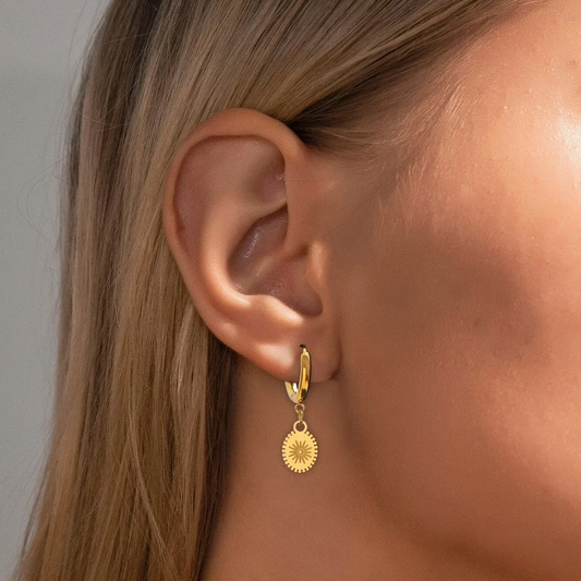 Boucles d'oreilles vintage soleil dorées