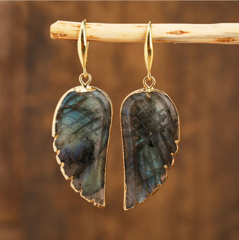 Boucles d'oreilles vintage noires en forme d'ailes dorées