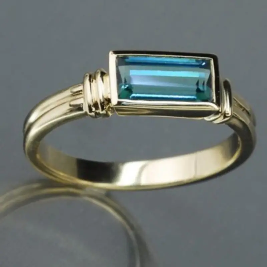 Bague vintage rectangulaire en verre bleu incrusté