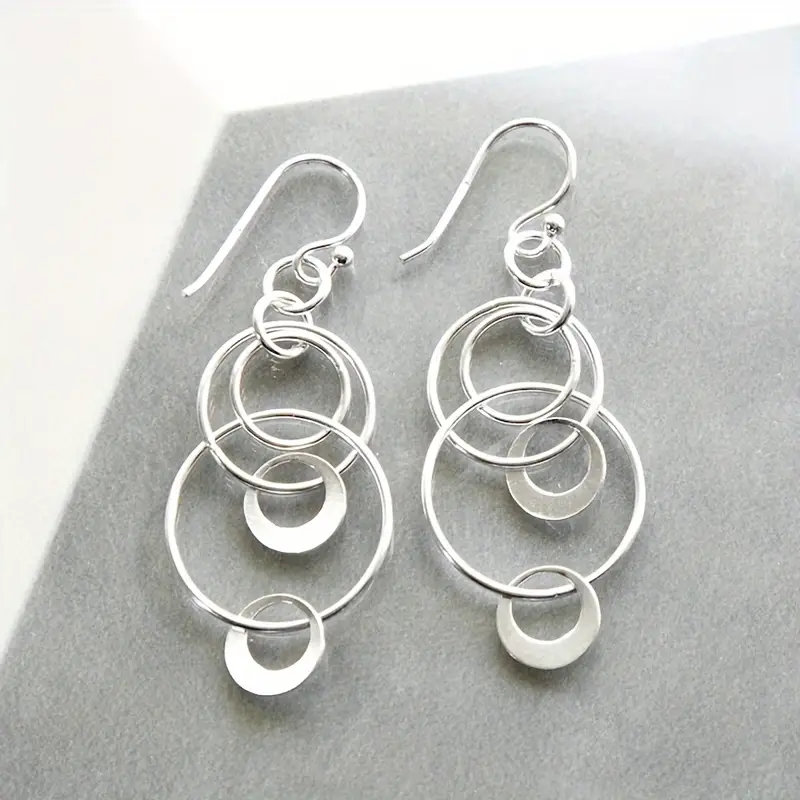 Boucles d'oreilles vintage pendantes en argent