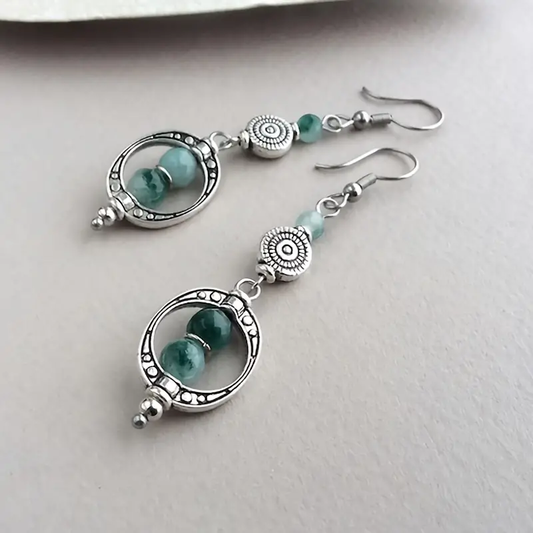Boucles d'oreilles vintage pendantes avec pierres vertes