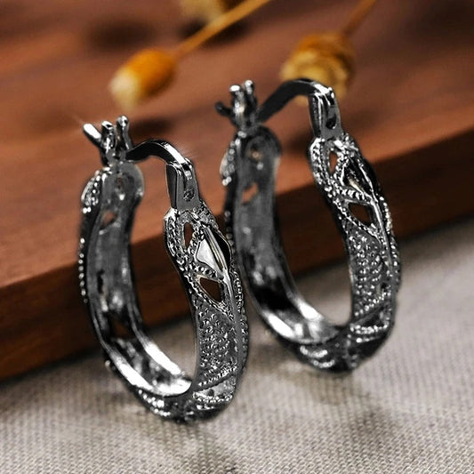 Boucles d'oreilles vintage en forme de feuilles creuses noires - Lydieannejewelry