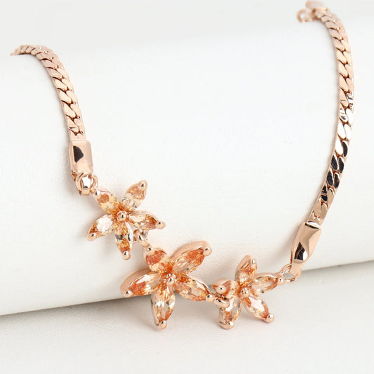 Bracelet vintage en or rose avec trois fleurs multicolores - Lydieannejewelry