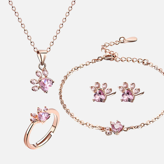 Ensemble de bijoux en or rose avec motif patte – 4 pièces avec cœur en zircone (bague, collier, boucles d'oreilles, bracelet)