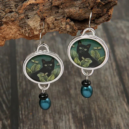 Boucles d'oreilles pendantes vintage tropicales avec chat noir