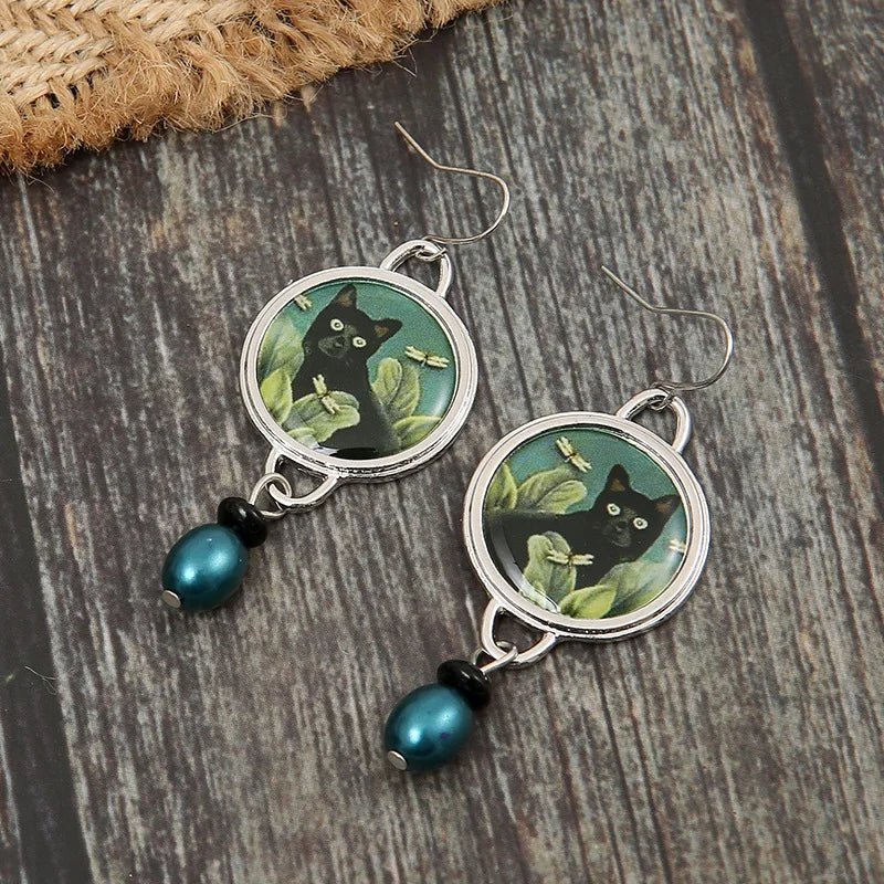 Boucles d'oreilles pendantes vintage tropicales avec chat noir