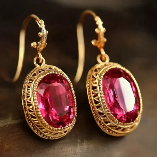 Boucles d'oreilles vintage en verre grenat et or
